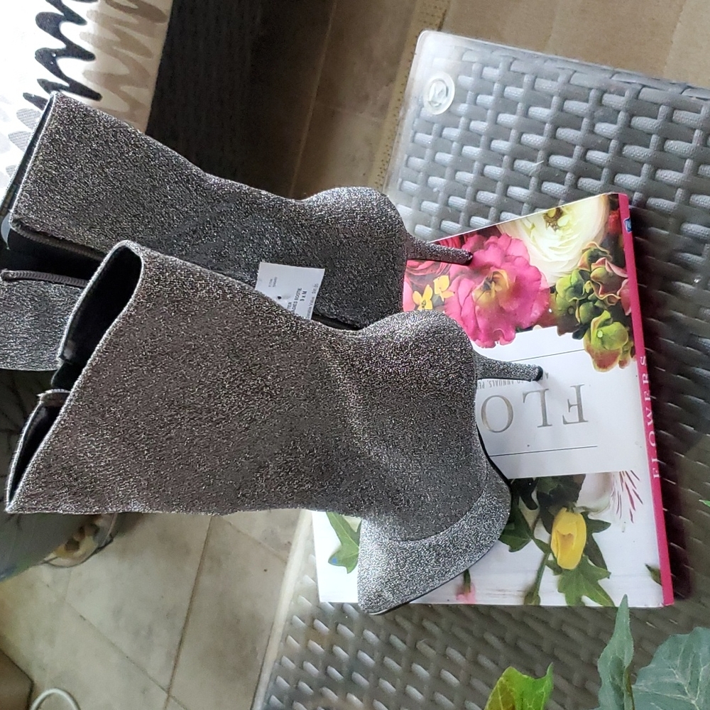 Brand New Never Worn Pewter Ankle Boots, heel height 4 inches .